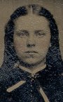 Unidentified photo secured in album with duck tape